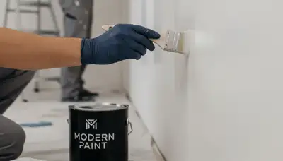 Bakersfield, CA painting crew fixing paint touch-ups on a home exterior for sun and dust damage